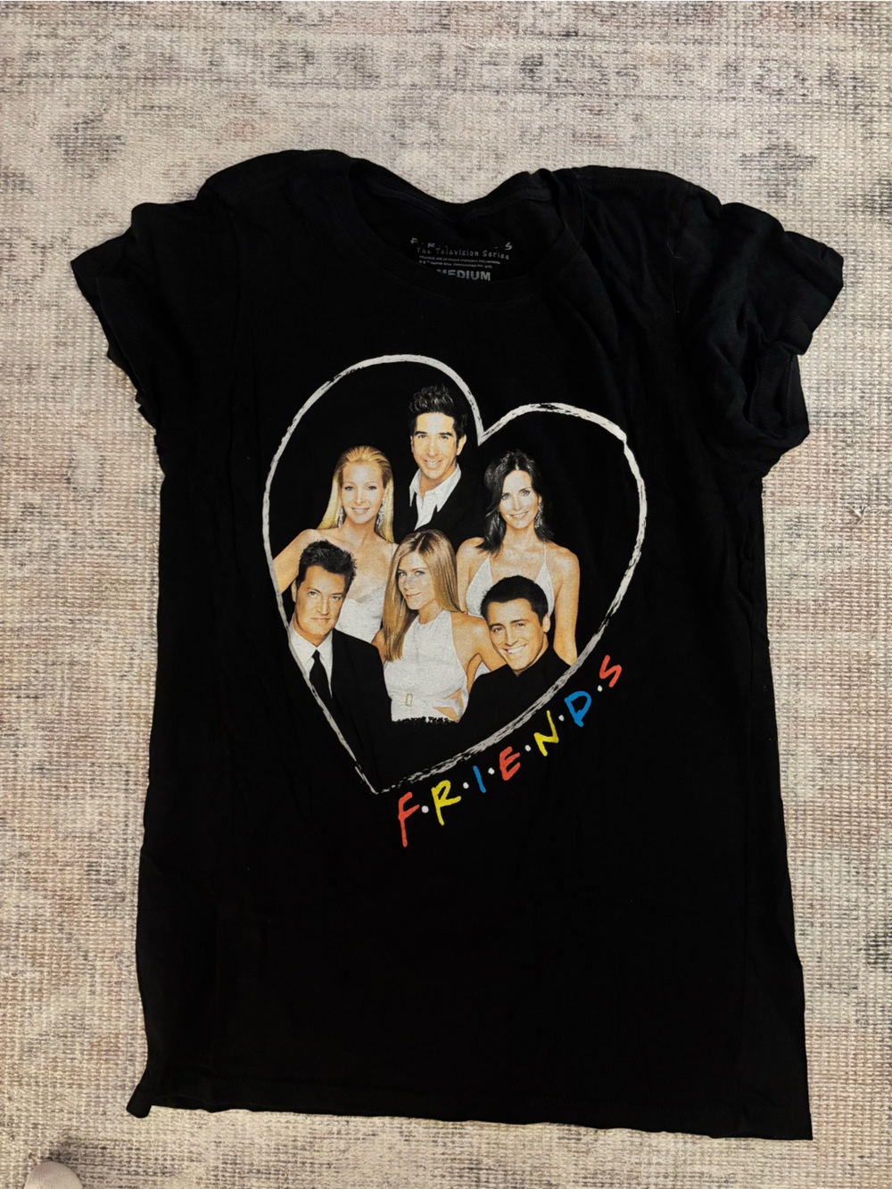 FRIENDS Black Tee with Cast Heart Portrait and Colorful Logo